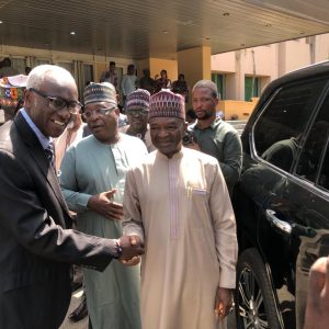 Professor Dele Tolongbose, President NIFAAS and Dr. Mohammad Abubakar grab a handshake moment.