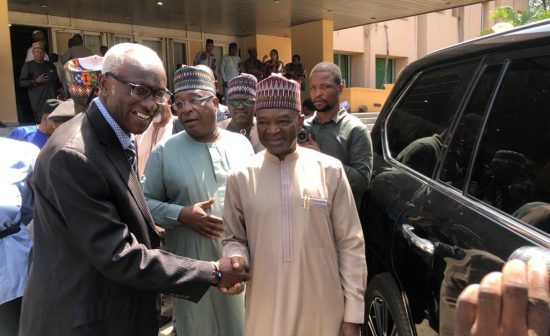 Professor Dele Tolongbose, President NIFAAS and Dr. Mohammad Abubakar grab a handshake moment.